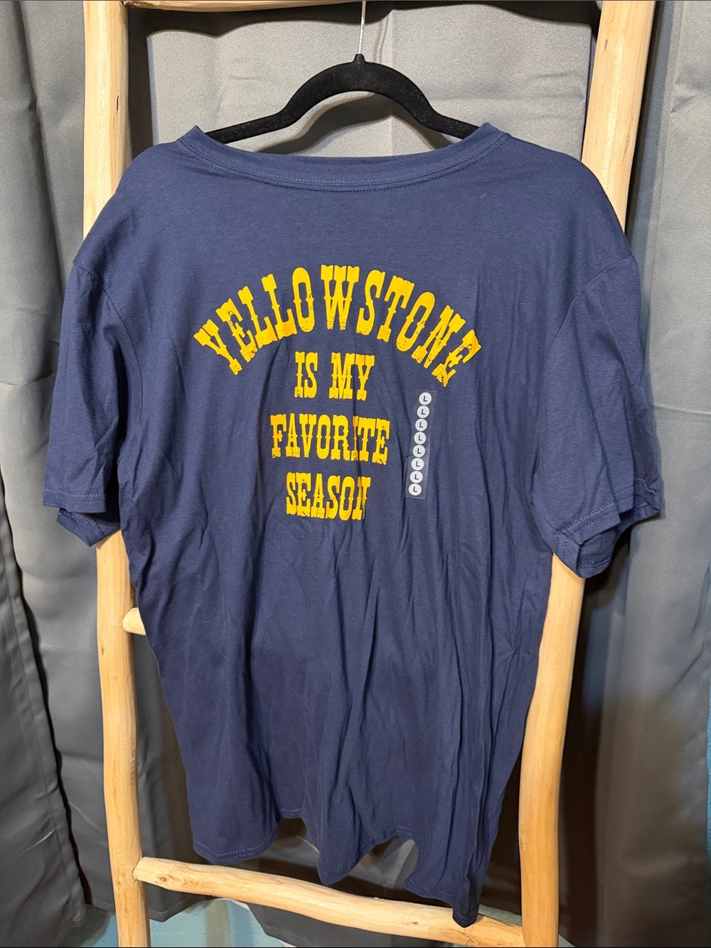 Gildan navy tee with bright yellow graphic